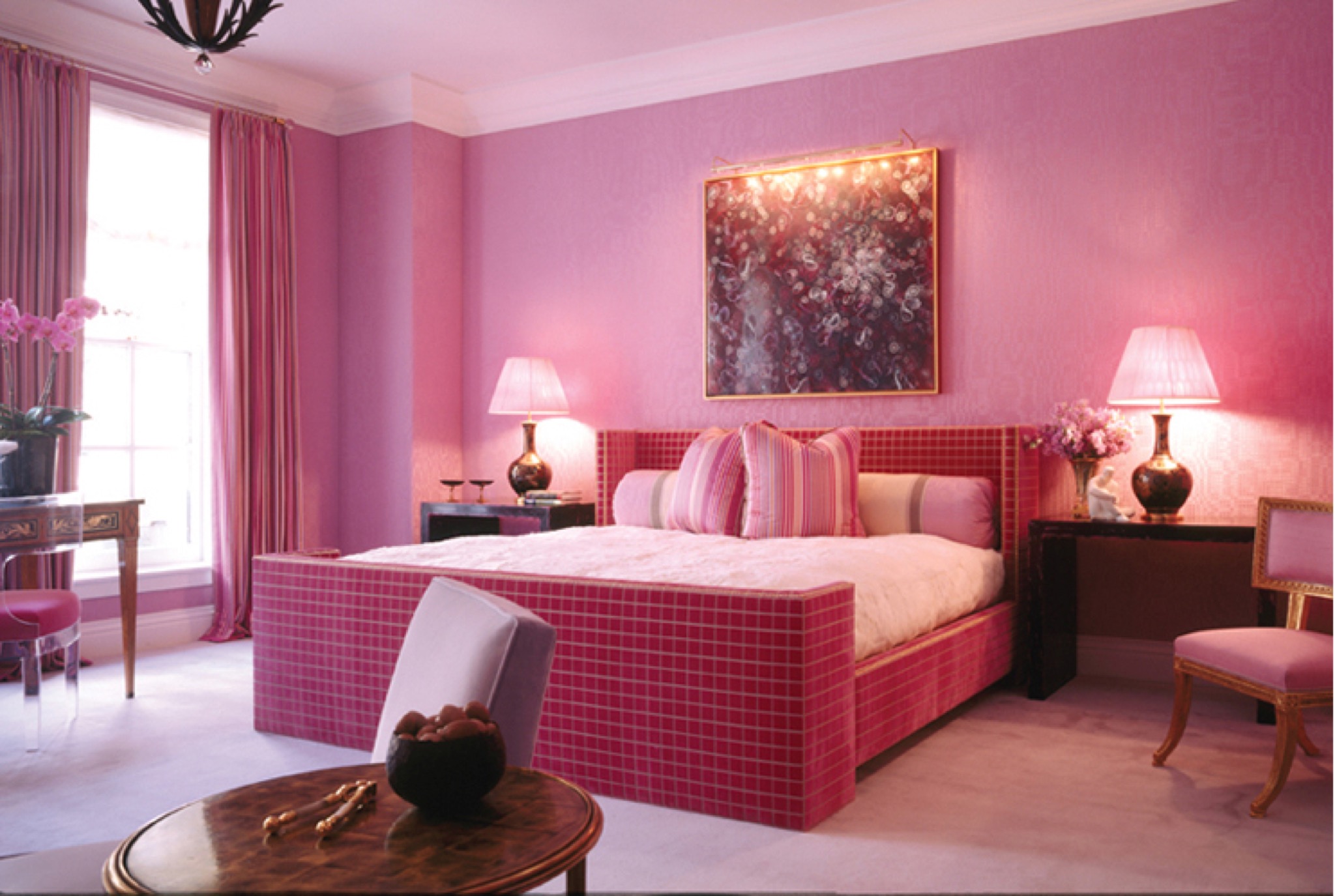 kips_pink_drapes_slipperchairs_ottoman_bed_beding_walluph